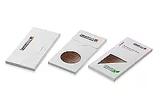 Three chocolate bars individually wrapped, two front sides and one back side