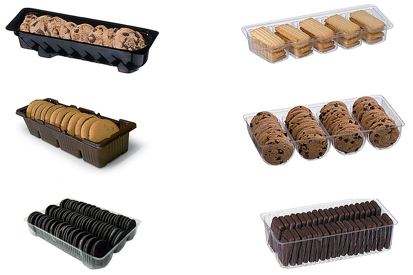 Trayloader TBS-2 für Keksverpackungen verschiedene Kekssorten in unterschiedlichen Trayloadern verpackt