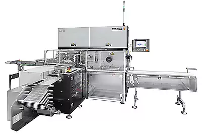 Compact single-stage automatic fold wrapping machine LTM Side view fold wrapping machine LTM for rectangular confectionery from Loeschpack