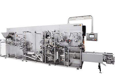 vista lateral envolvedora de pliegues RPM-S de Loeschpack para confitería