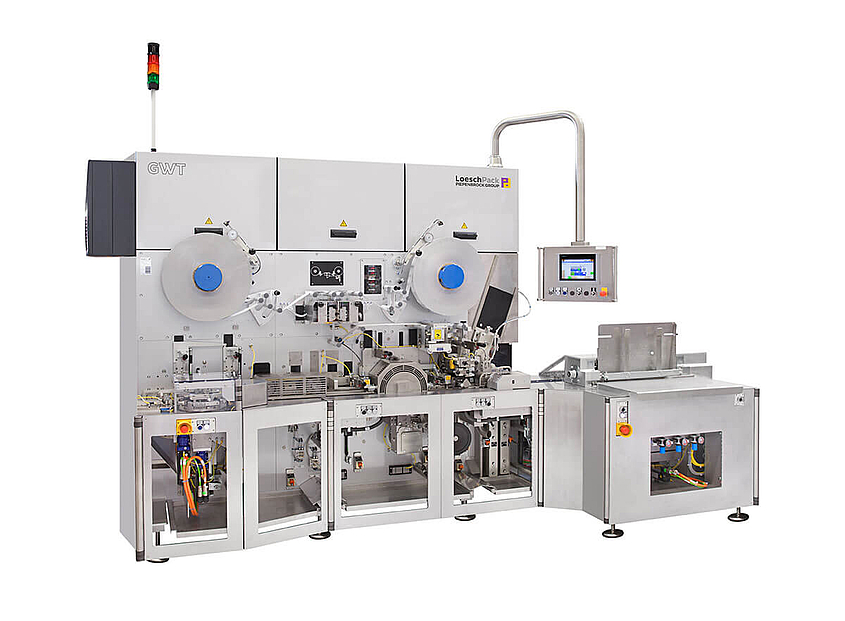 Falteinschlagmaschine GWT von Loeschpack seitliche Gesamtansicht Falteinschlagmaschine GWT von Loeschpack