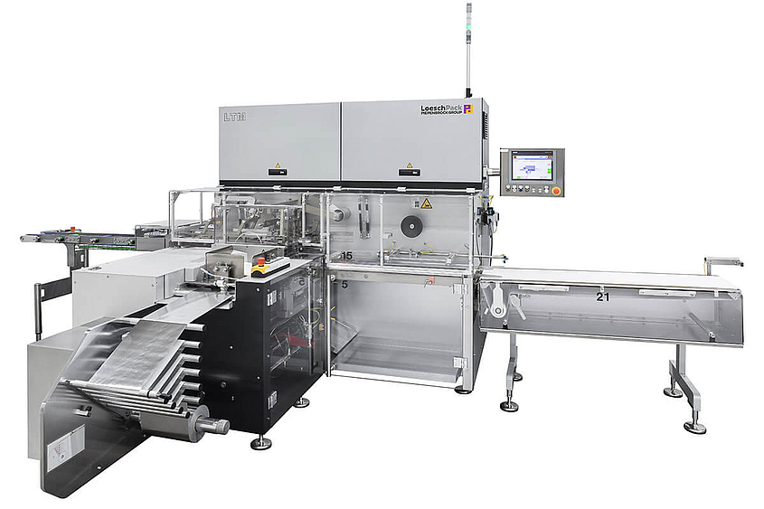 Plegadora automática compacta de una etapa LTM Vista lateral máquina envolvedora LTM para confitería rectangular de Loeschpack
