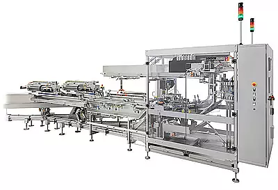 Flexible automatic tray loader TBS-2 from LoeschPack side view trayloader TBS-2 from Loeschpack