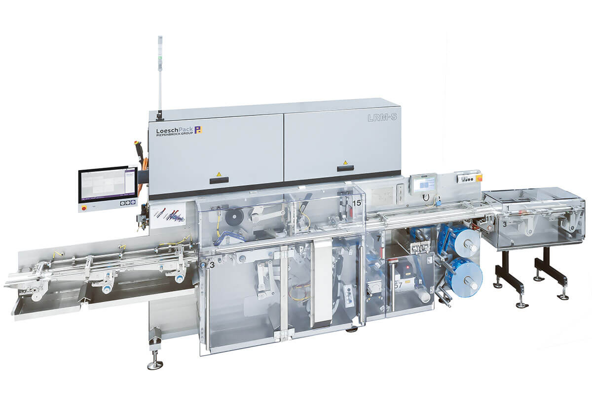 Kompakte Falteinschlagmaschine LRM-S von Loeschpack seitliche Ansicht der Schokoladenfalteinschlagmaschine LRM-S von Loeschpack