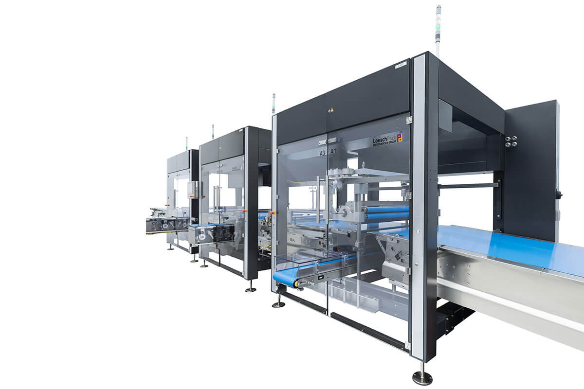 Vista lateral del sistema Lomatic de alimentación y distribución de tabletas y tabletas de chocolate